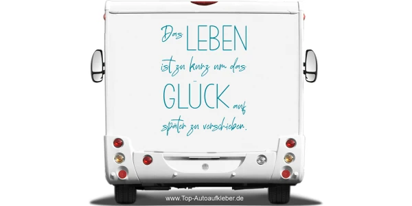 Wohnmobilaufkleber Glück auf Heck eines hellen Wohnmobils